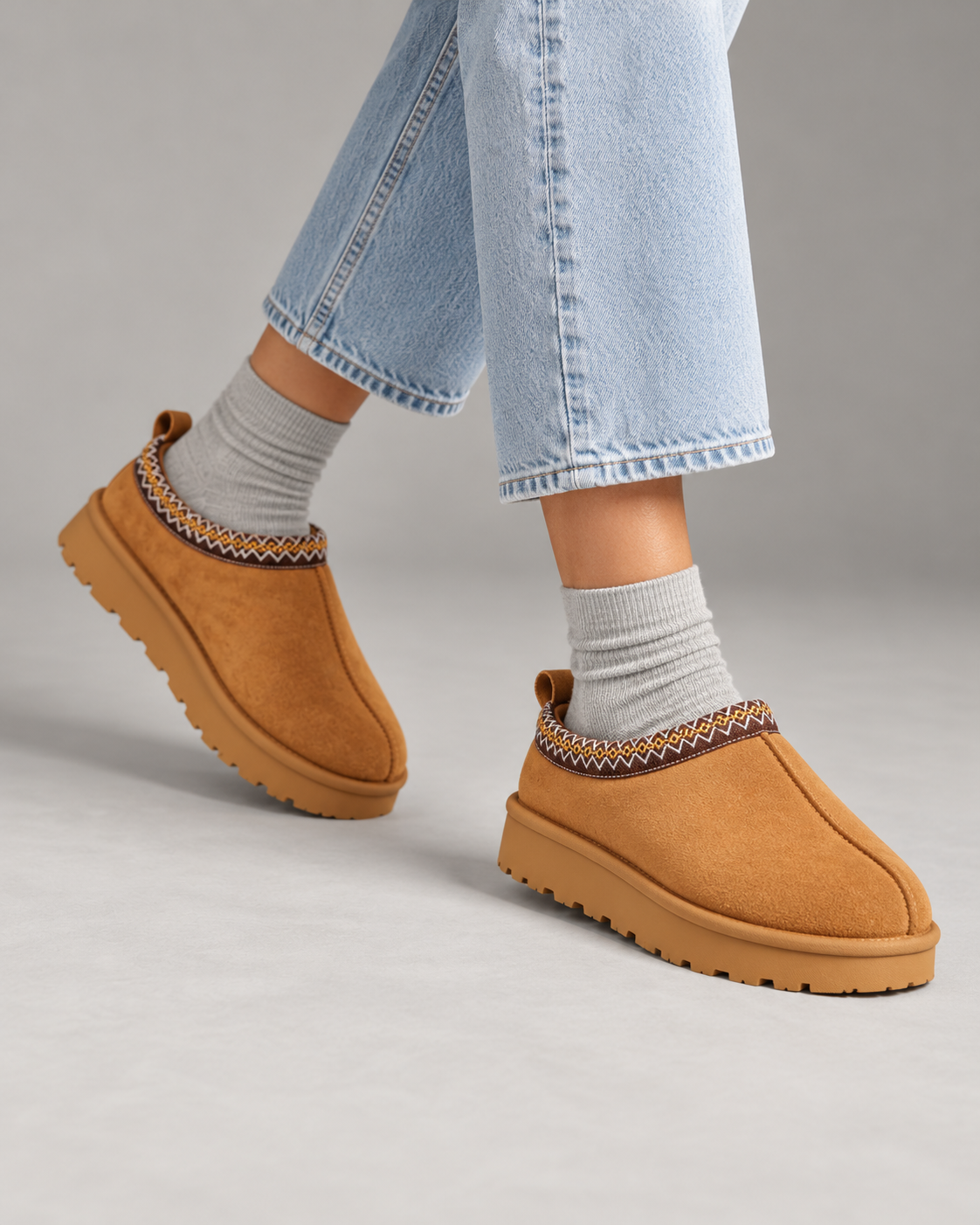 Slipperella caramel Aztec slipper boots styled with light blue jeans and grey socks