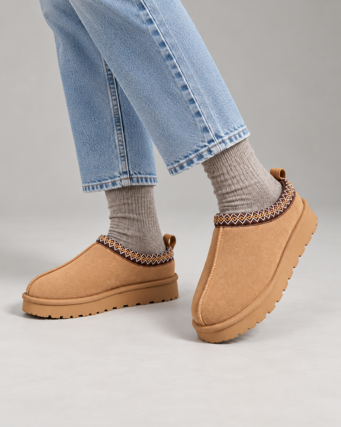 Slipperella camel Aztec slipper boots styled with light blue jeans and grey socks