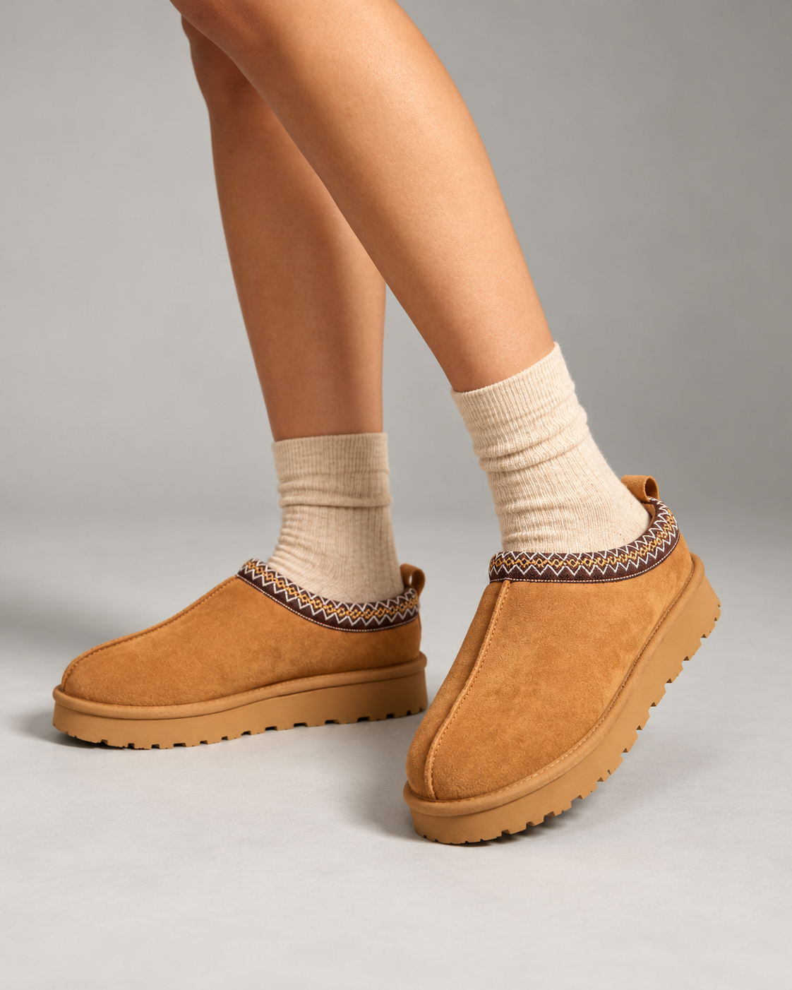 Slipperella caramel Aztec slipper boots worn with cream socks
